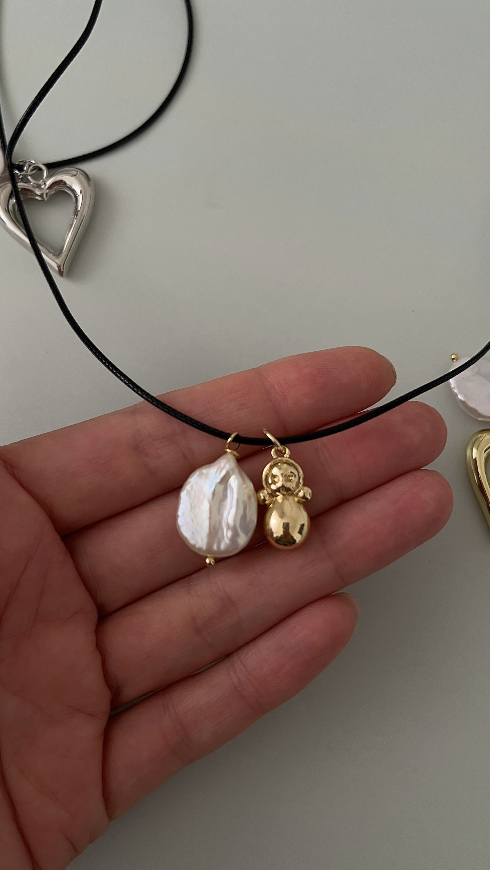 Матрешка и жемчуг