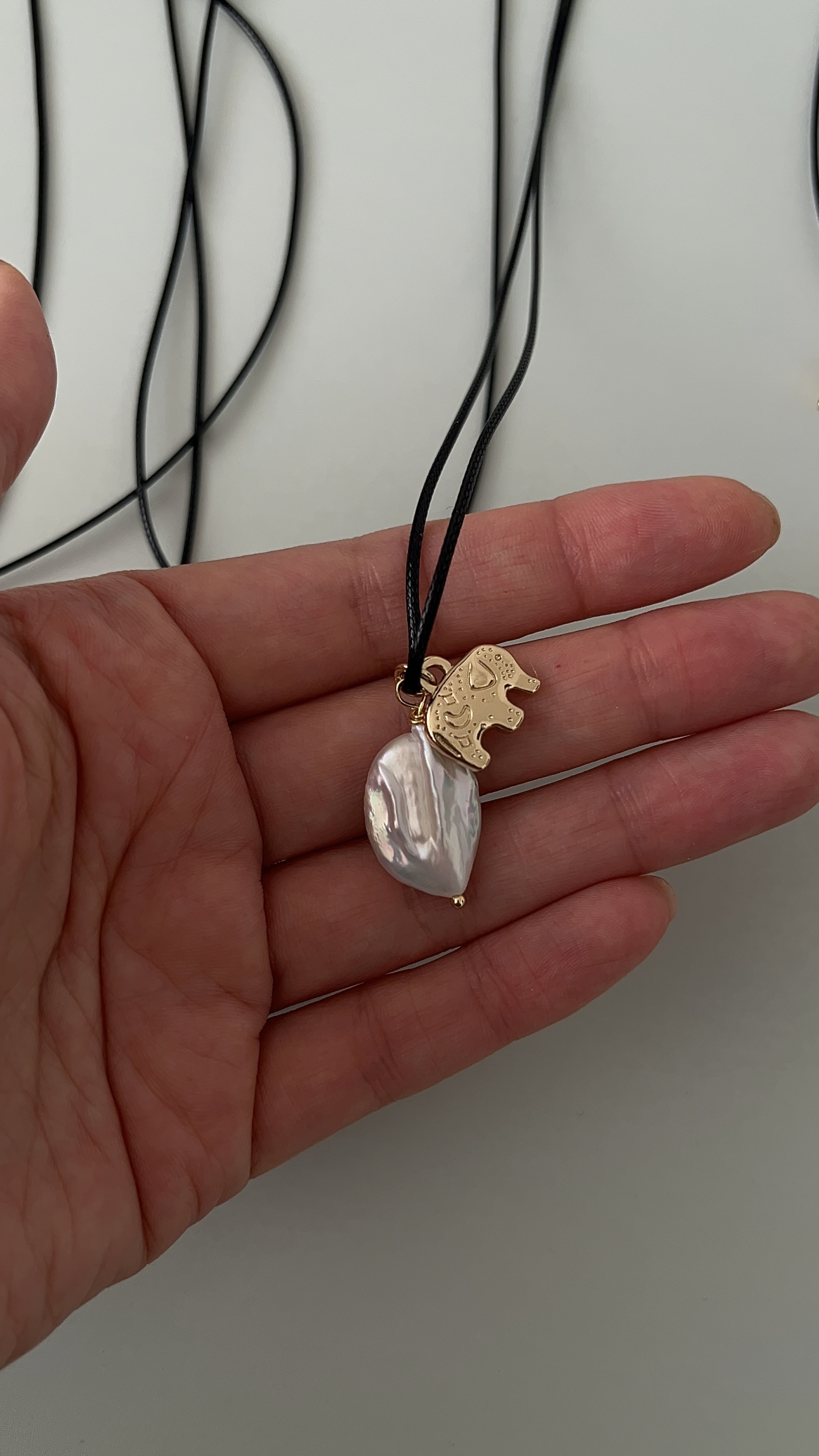 Слон и жемчуг